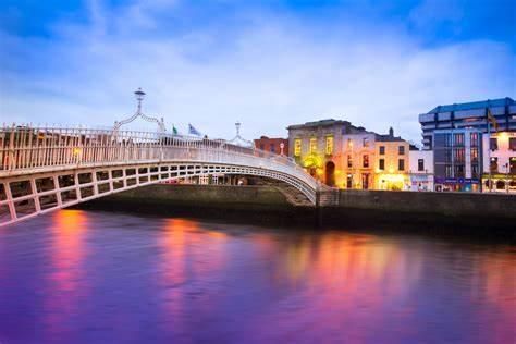 The River Liffey lit up at dusk in Dublin