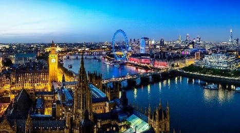 The Thames and the Houses of Parliament lit up at night in London